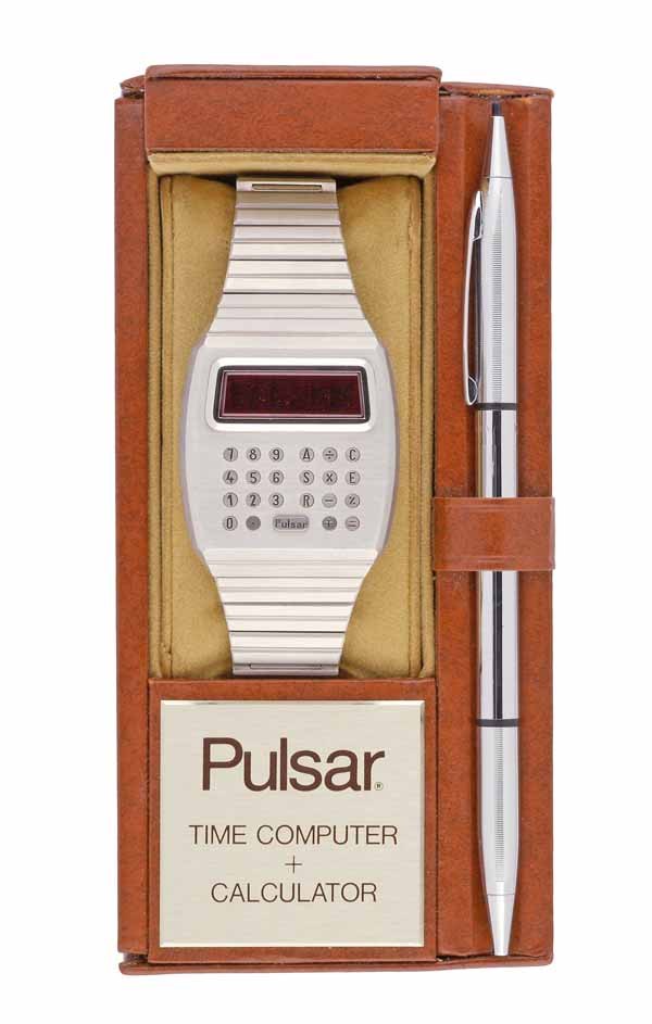 Figure 4 — A Pulsar Time Computer Calculator with its box and the pen whose tip worked the keys.