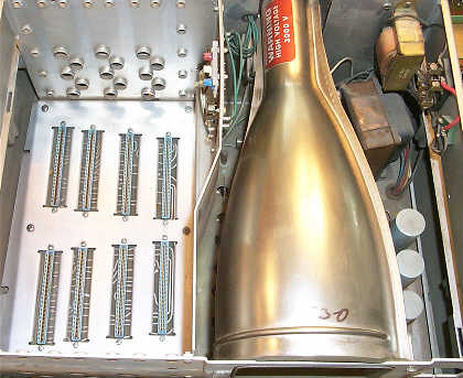 Figure 4 — The EC-132's card cage beside the tube: eight boards in pairs.