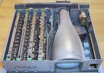 Figure 3 — Inside an EC-132: the paired logic boards on the left, the tube in its shield on the right.
