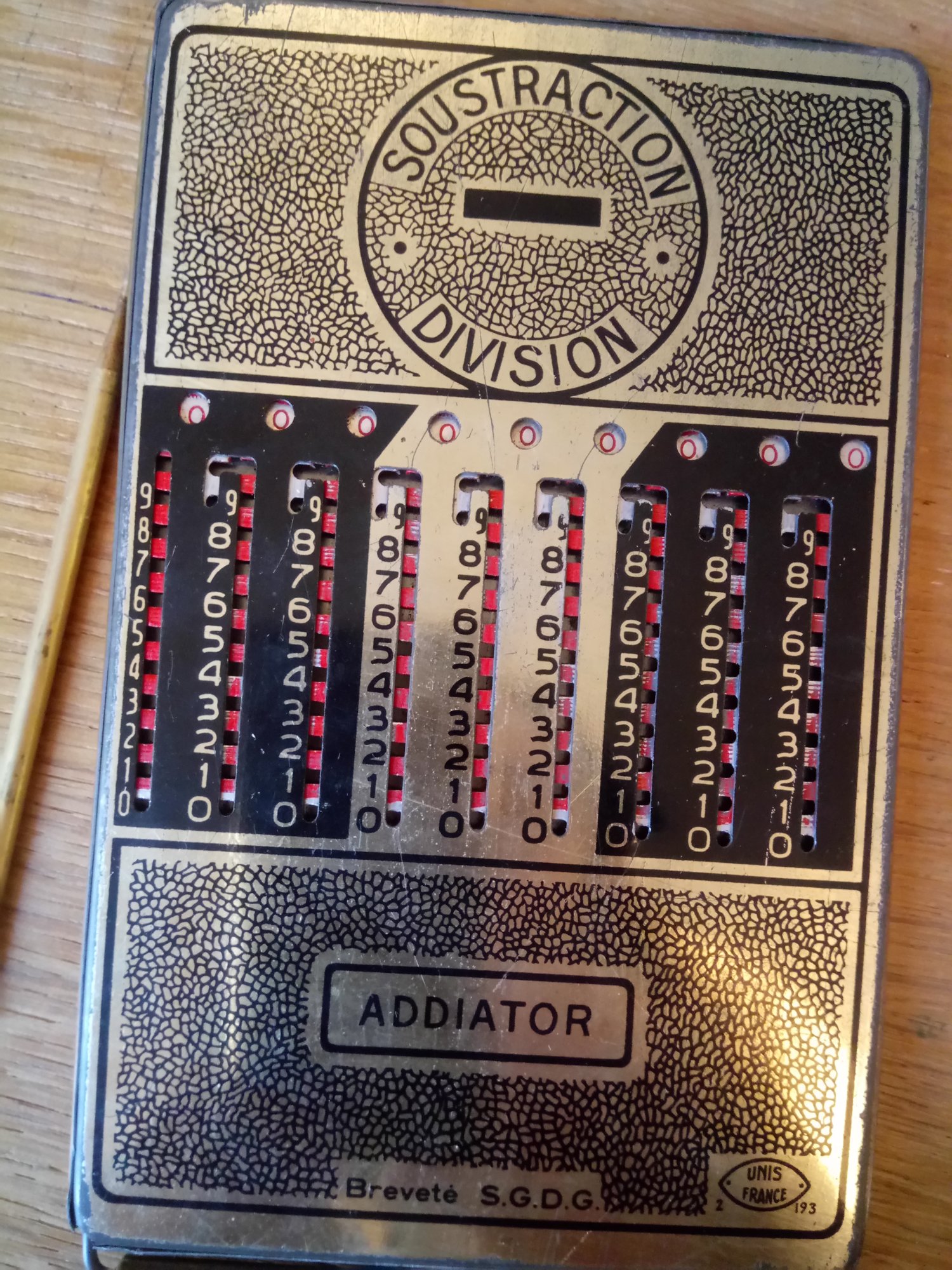 Figure 20 — A cousin of another type: an Addiator slide adder of 1956. Its stylus pulls toothed slides rather than turning dials.