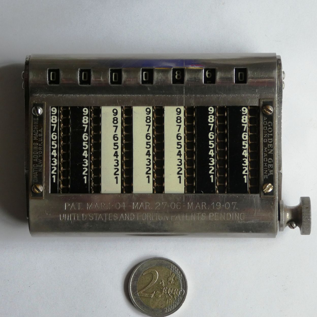 Figure 21 — Another type again: the Golden Gem chain adder, with patent dates of 1904, 1906 and 1907 on its case.