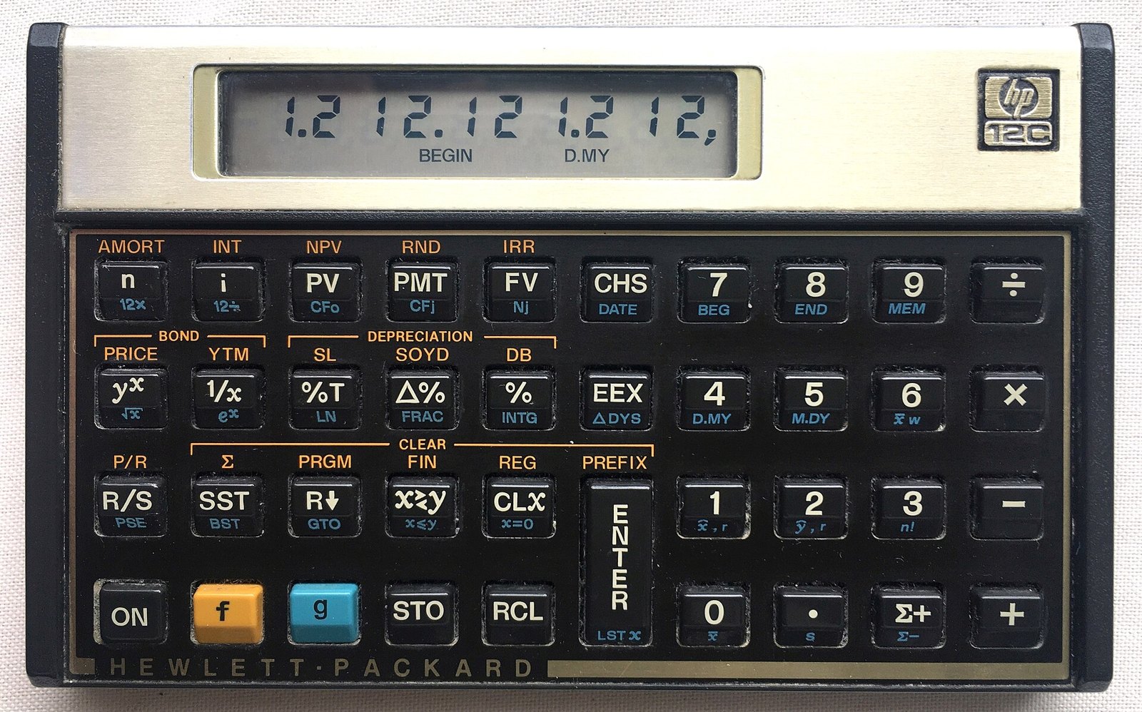 Figure 3 — An HP-12C made in Brazil in 1988, with "HEWLETT·PACKARD" across the bottom of the faceplate, the wording dropped from my 2022 calculator.