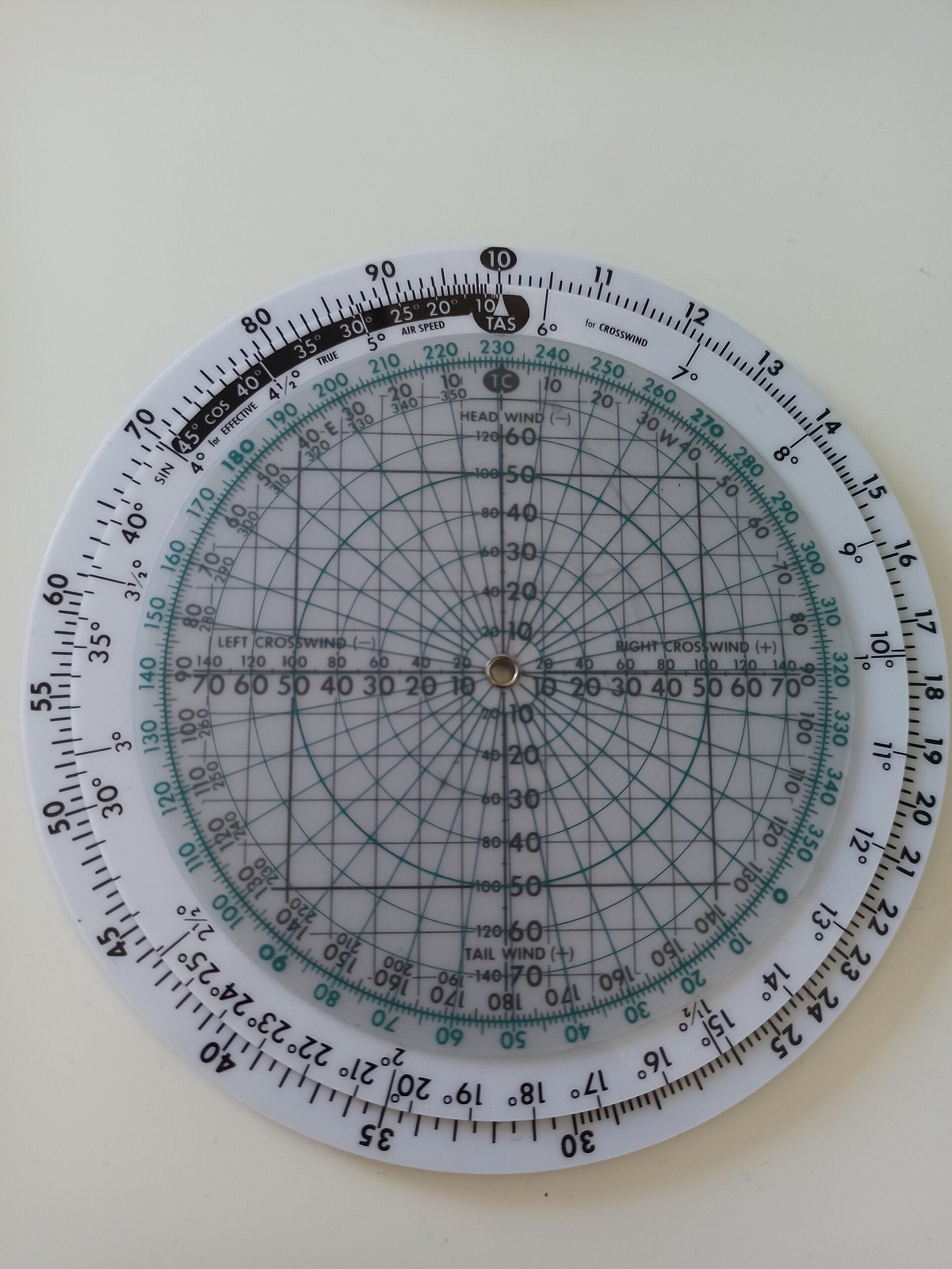 Figure 10 — A Jeppesen CR-3, a circular computer that solves the wind triangle with sine and cosine scales instead of a sliding grid.