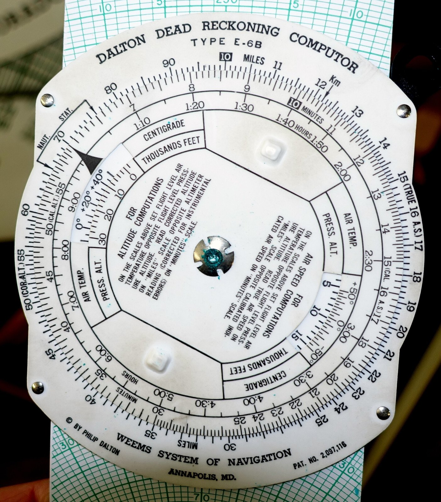 Figure 6 — The calculator side of a "Dalton Dead Reckoning Computor, Type E-6B", Weems System of Navigation, Annapolis: the miles and minutes scales and the windows for altitude and airspeed corrections.