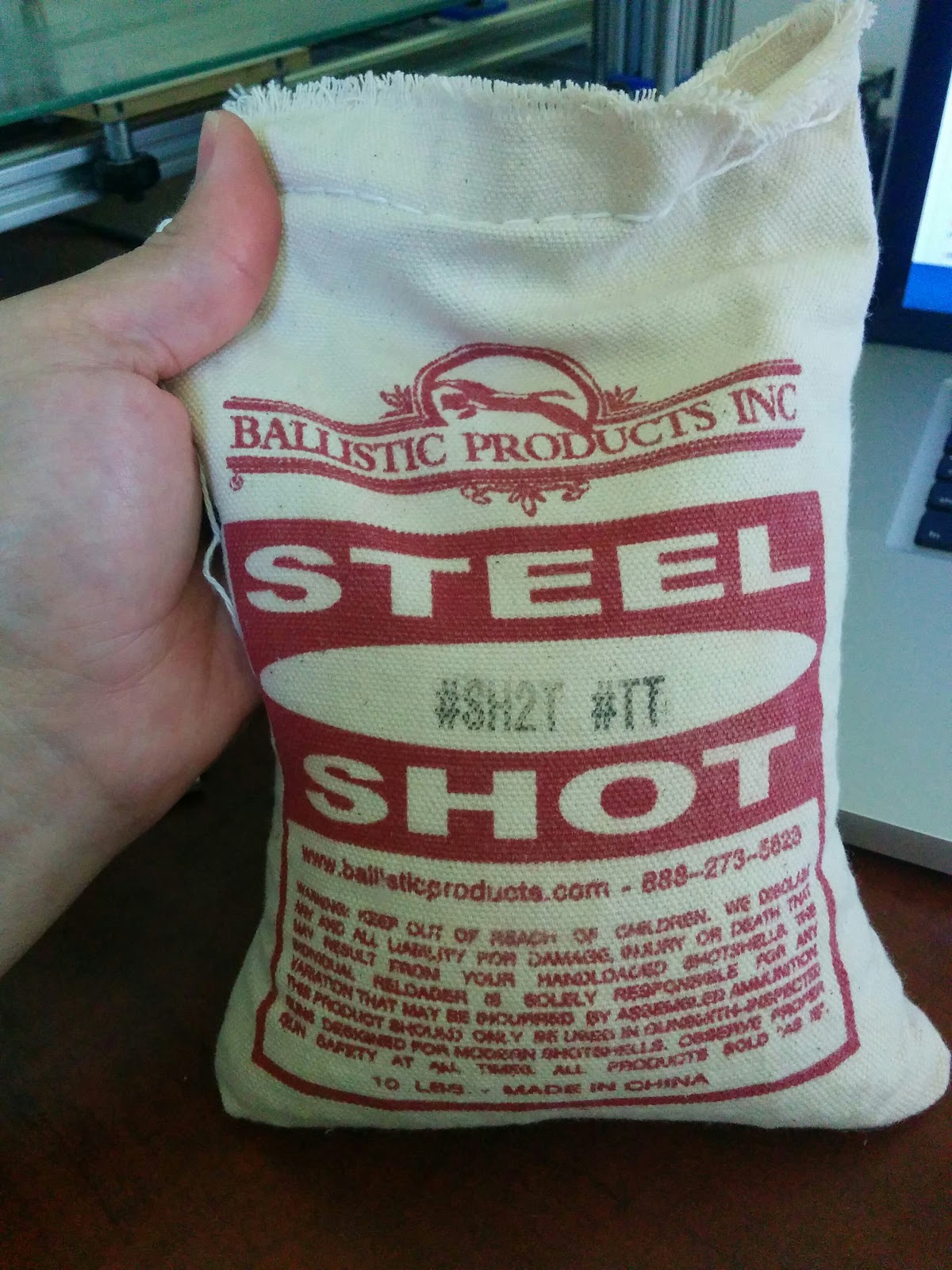 Figure 7 — A ten-pound bag of steel shot from a shotgun-reloading supplier, bought as the machine's ball bearings and detent balls.