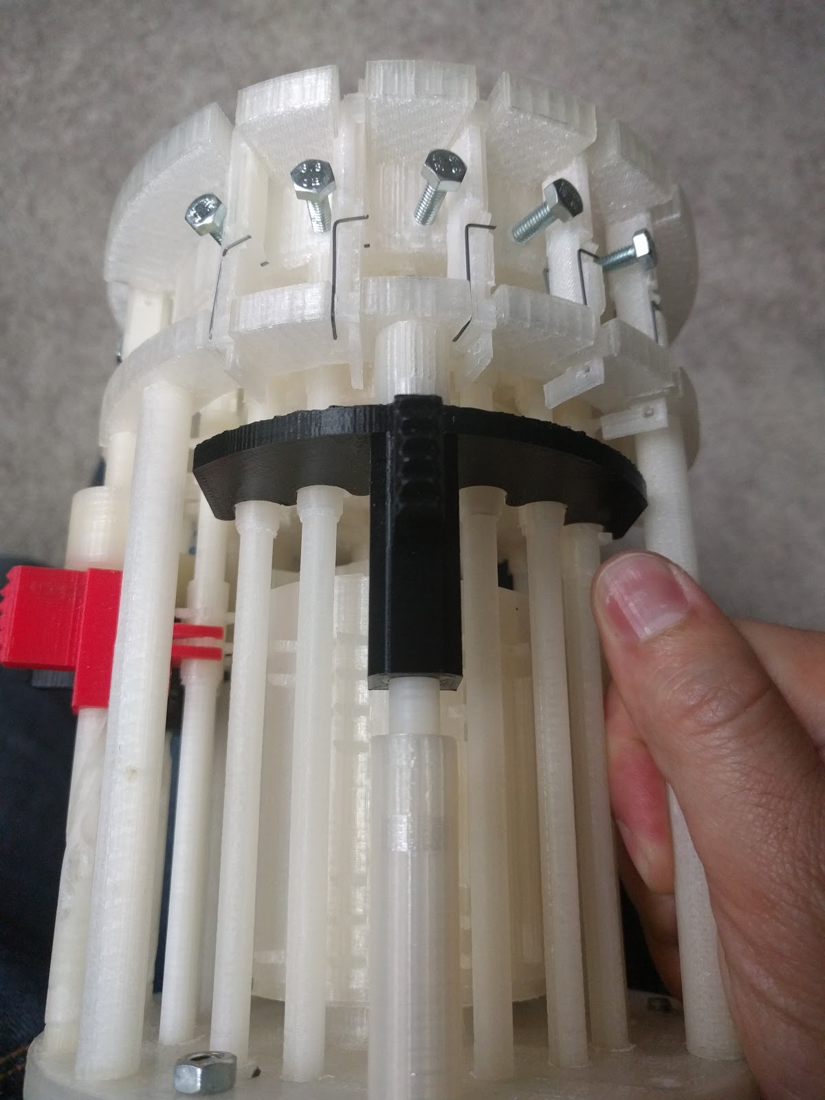 Figure 4 — The underside, showing the support columns and the transmission running between the plates.