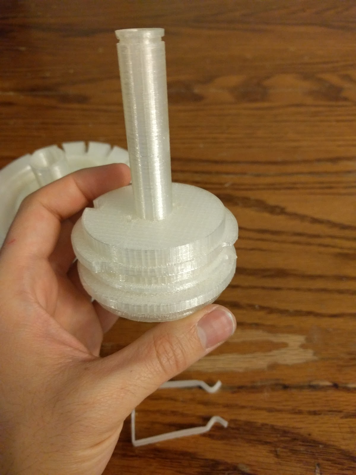 Figure 5 — The main body in one hand. On an original Curta this is the part that fits in a palm; at 3:1 it fills two.