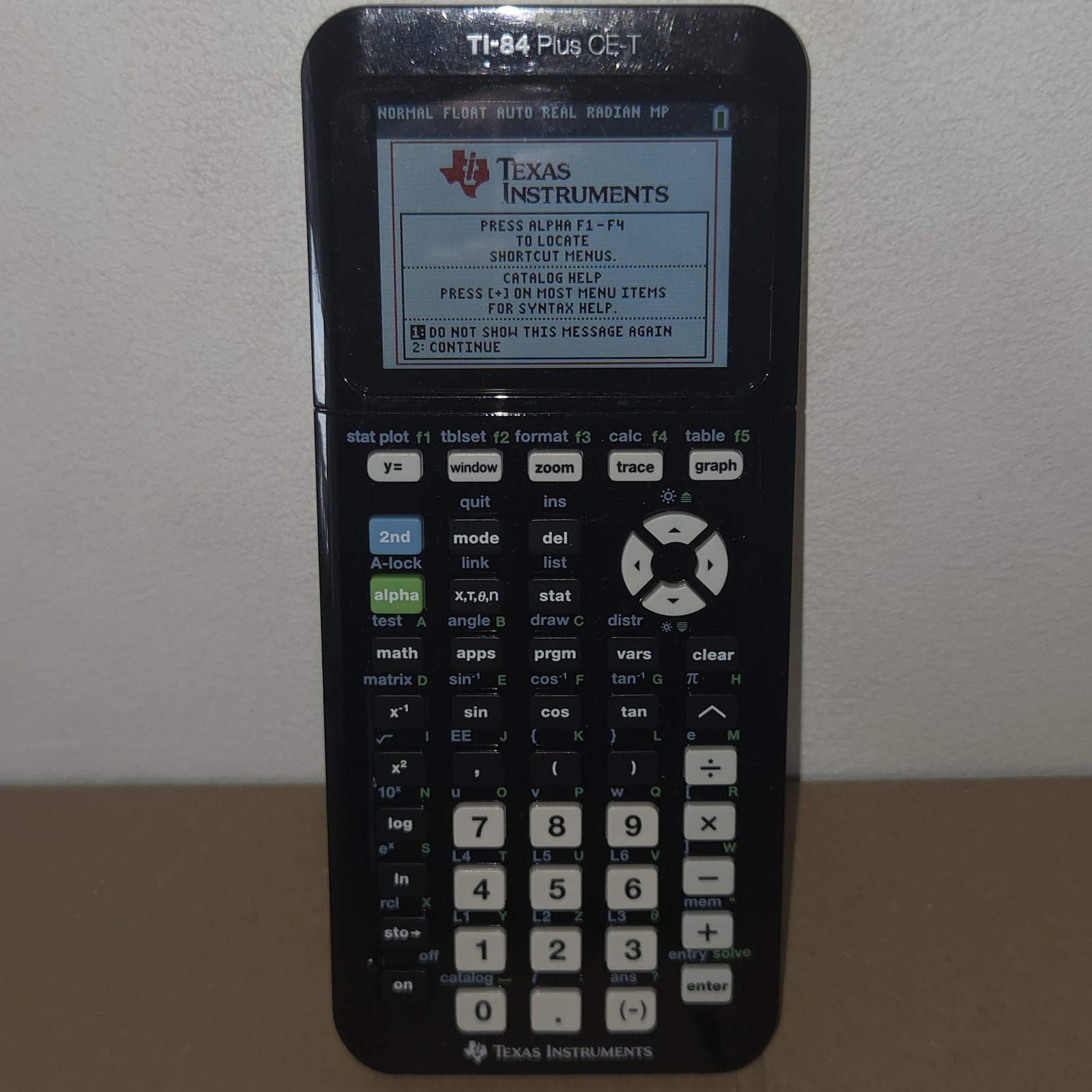 Figure 4 — The European TI-84 Plus CE-T Python Edition, in black with its white slide case and box.