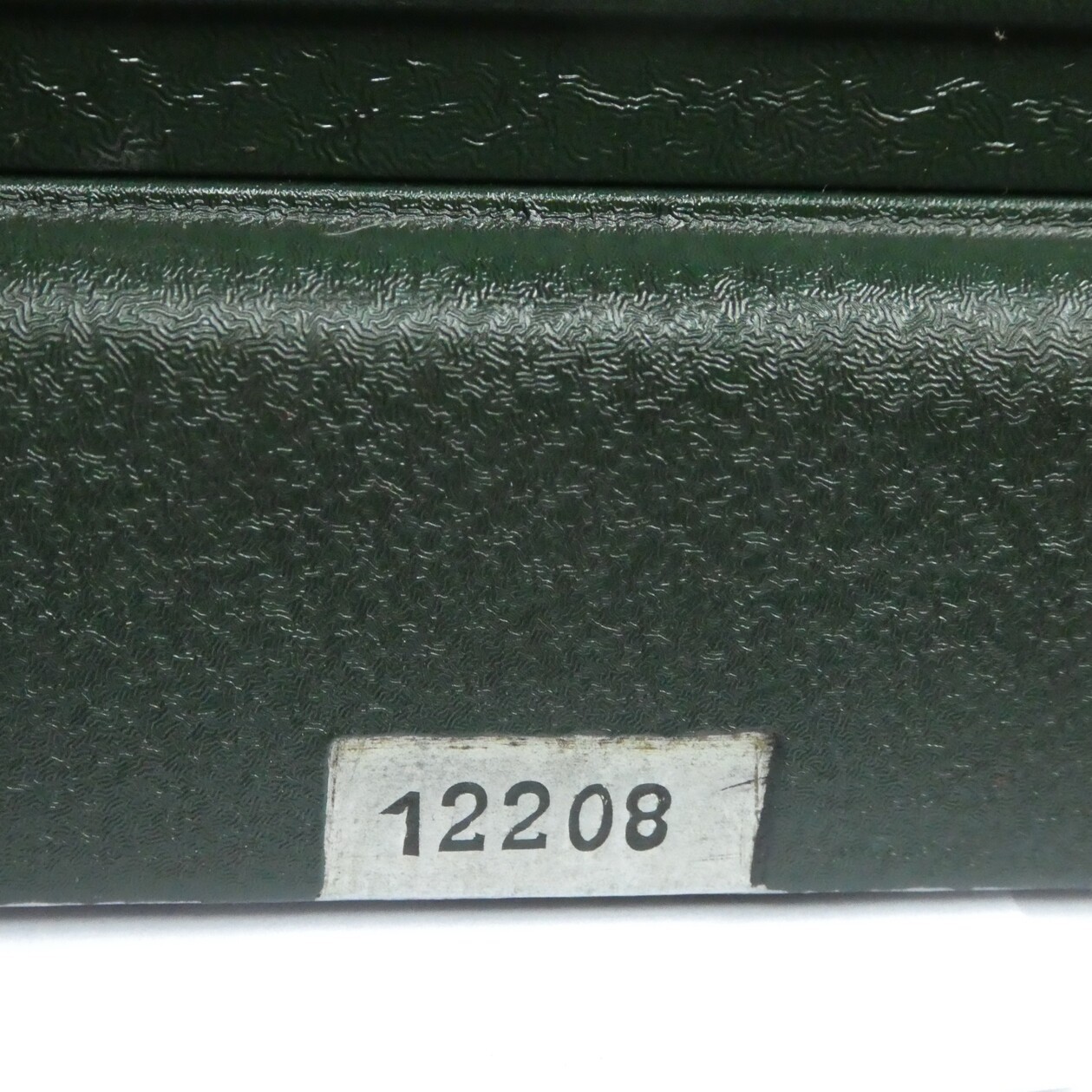 Figure 12 — Later machines carry the number on a label: serial 12208 on a Manus E.