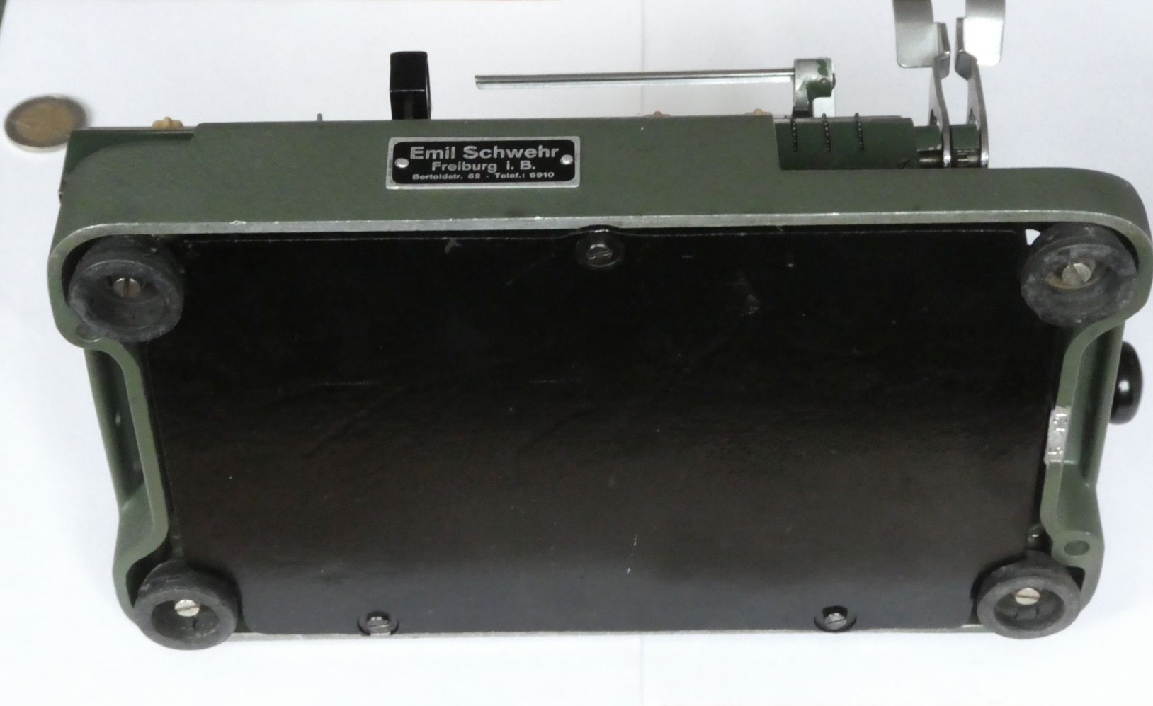 Figure 13 — The underside of a Manus F with the plate of its dealer, Emil Schwehr of Freiburg: the same kind of dealer's plate as the Recklinghausen one on my machine.