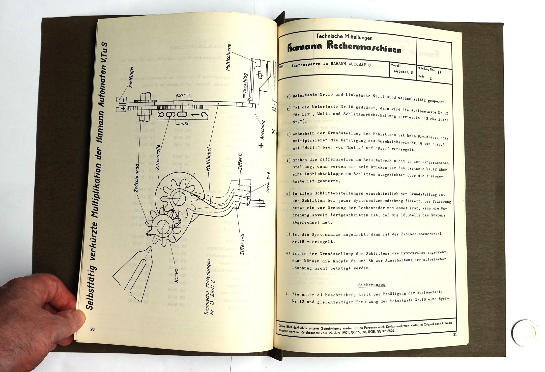 Figure 2 — The factory repair manual for the Hamann Automat S, about 1955, open at one of its technical drawings. The Automat S uses the same switching-latch drum as the Manus, and the manual's fault table an…