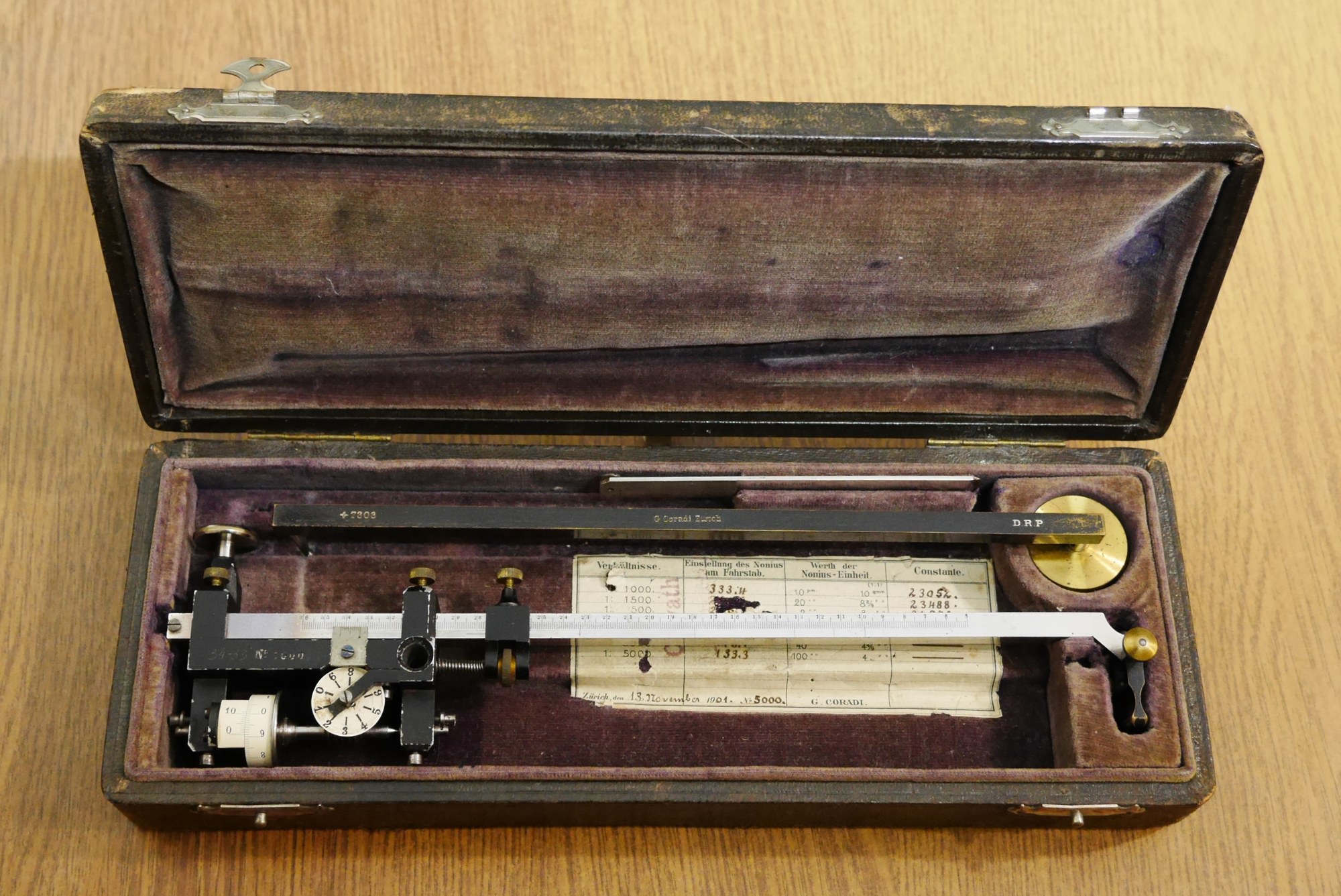 Figure 6 — A Coradi compensating polar planimeter of about 1901, signed "G. Coradi Zürich", in its case. K&E's first 4242s were Coradi instruments.