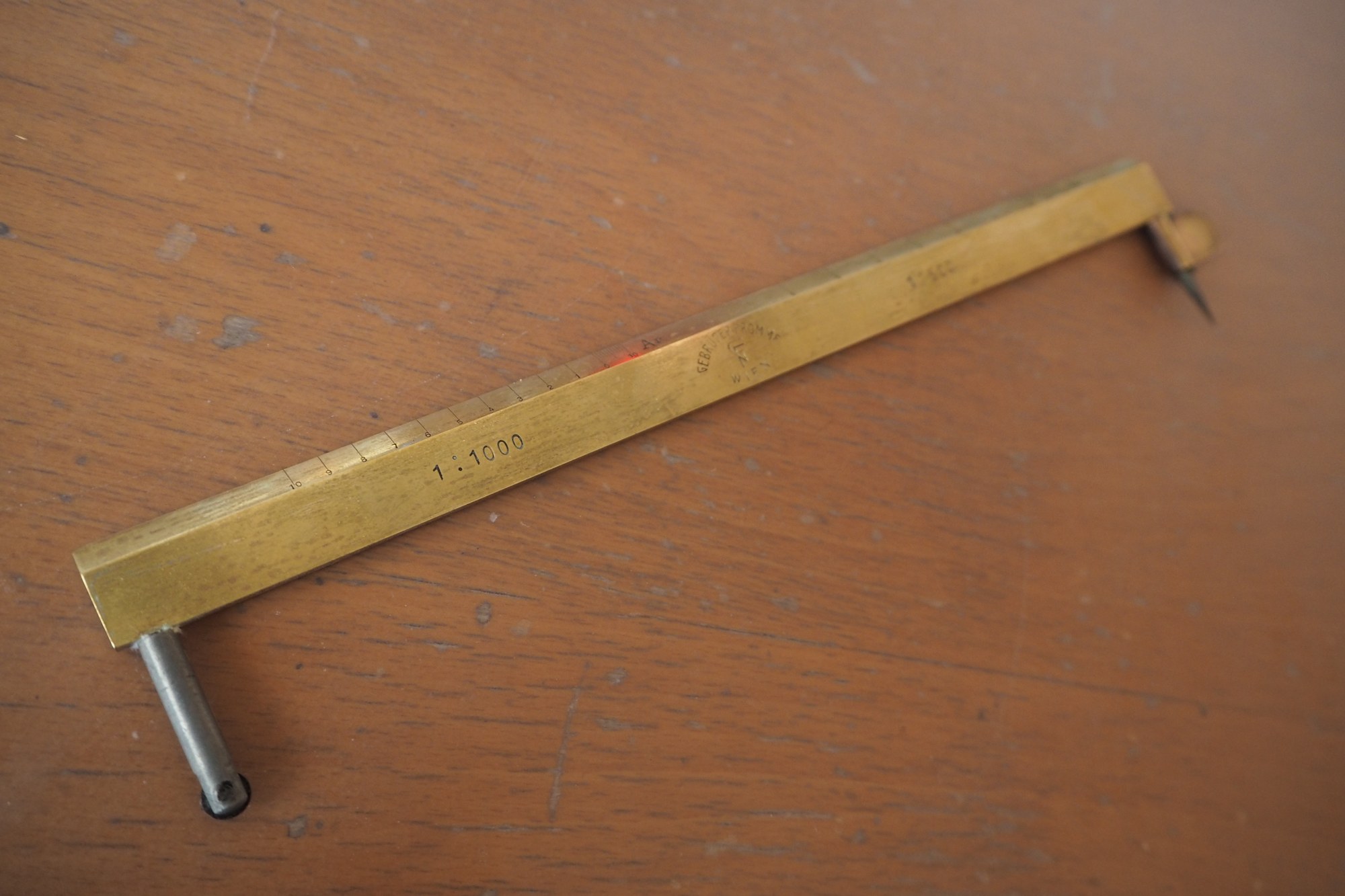 Figure 5 — A Prytz hatchet planimeter: a bent rod with a pointer and a knife edge, and nothing else.