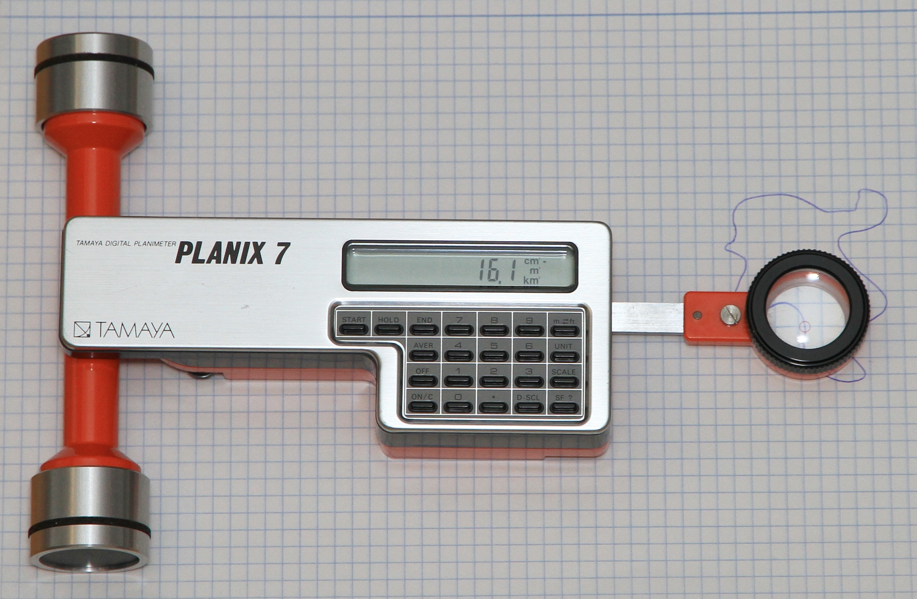 Figure 14 — A Tamaya Planix 7 digital planimeter of the late 1990s: a rolling instrument with an electronic readout.