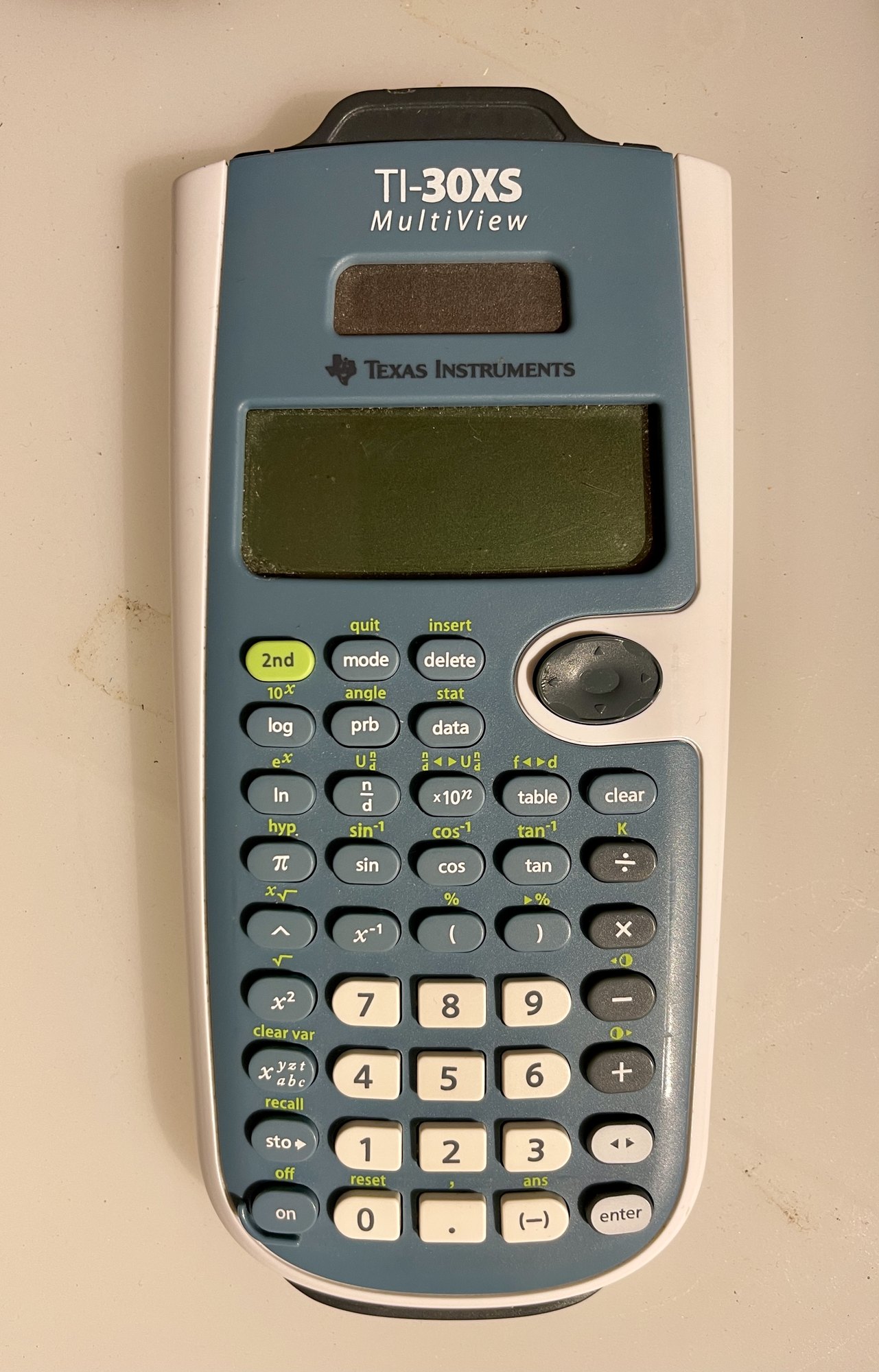 Figure 14 — The TI-30XS MultiView, TI's first non-graphing calculator with a dot-matrix display, showing four lines of calculation.