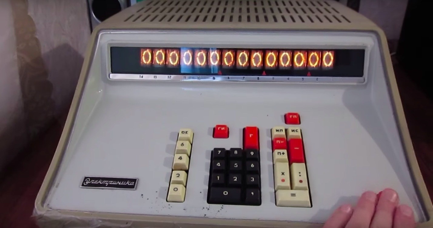 Figure 5 — The Elektronika 68, with its row of fourteen Nixie tubes: about 600 KT315 transistors and 1,500 diodes on fourteen circuit boards.