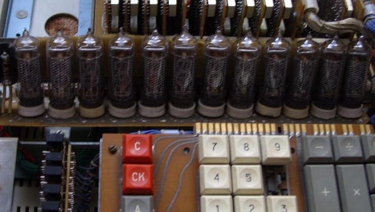 Figure 10 — The Nixie tubes of an Iskra 111M on their board, above the keyboard.