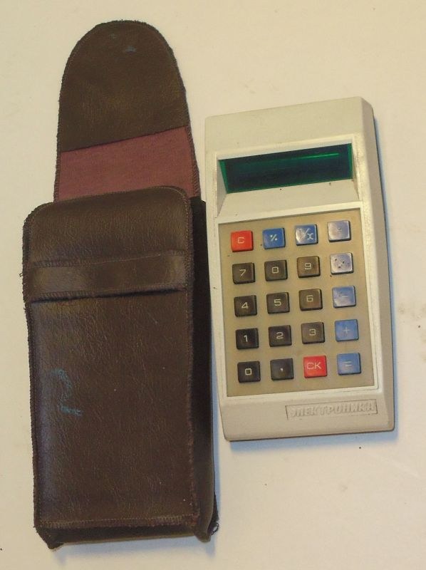 Figure 2 — An Elektronika B3-09M of about 1975–79 with its leather case: one of the first Soviet pocket calculators with a fluorescent display.