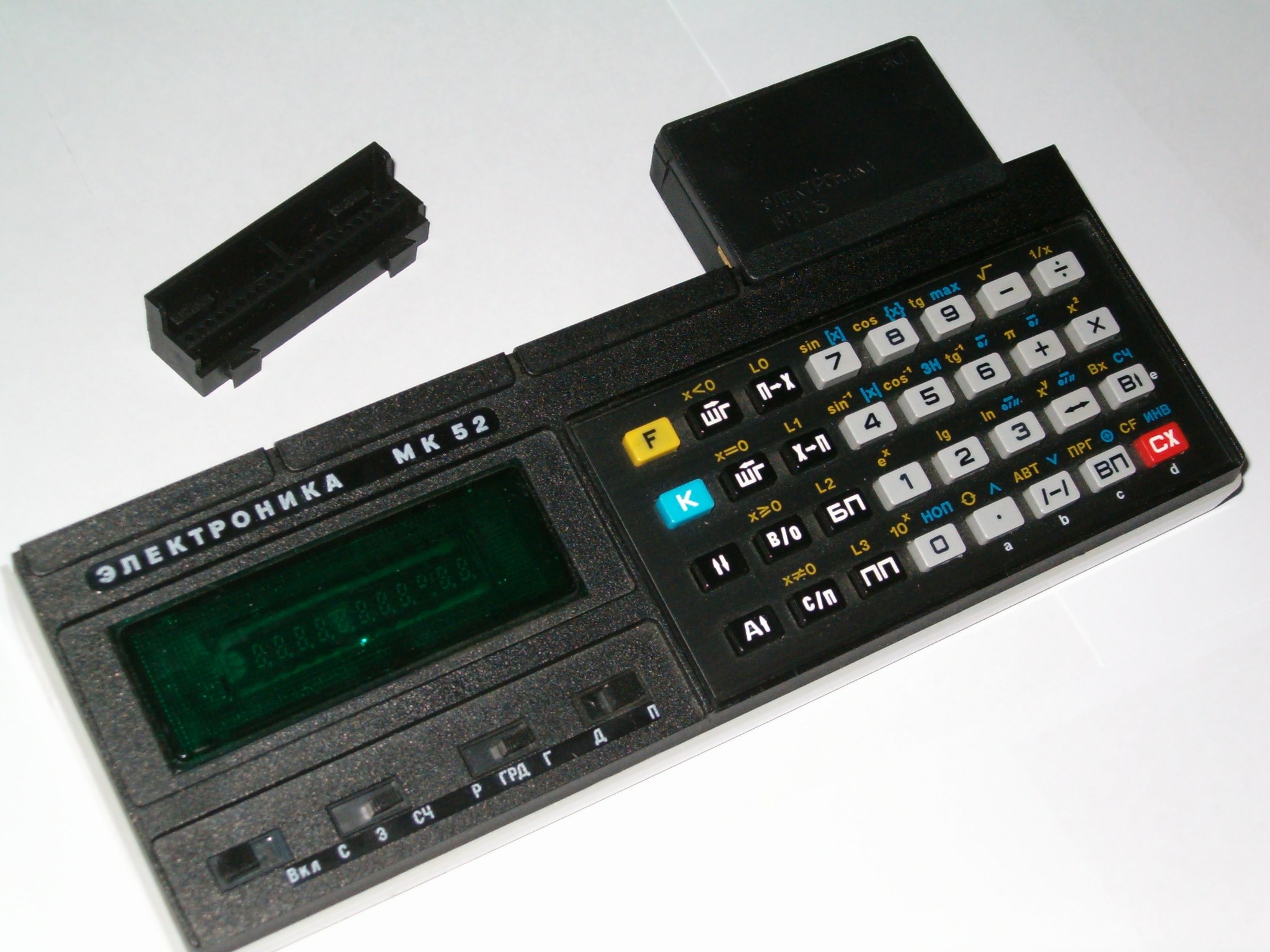 Figure 8 — An Elektronika MK-52 with a BRP-3 memory module beside its slot: sixty mathematical programs in a plug-in ROM.