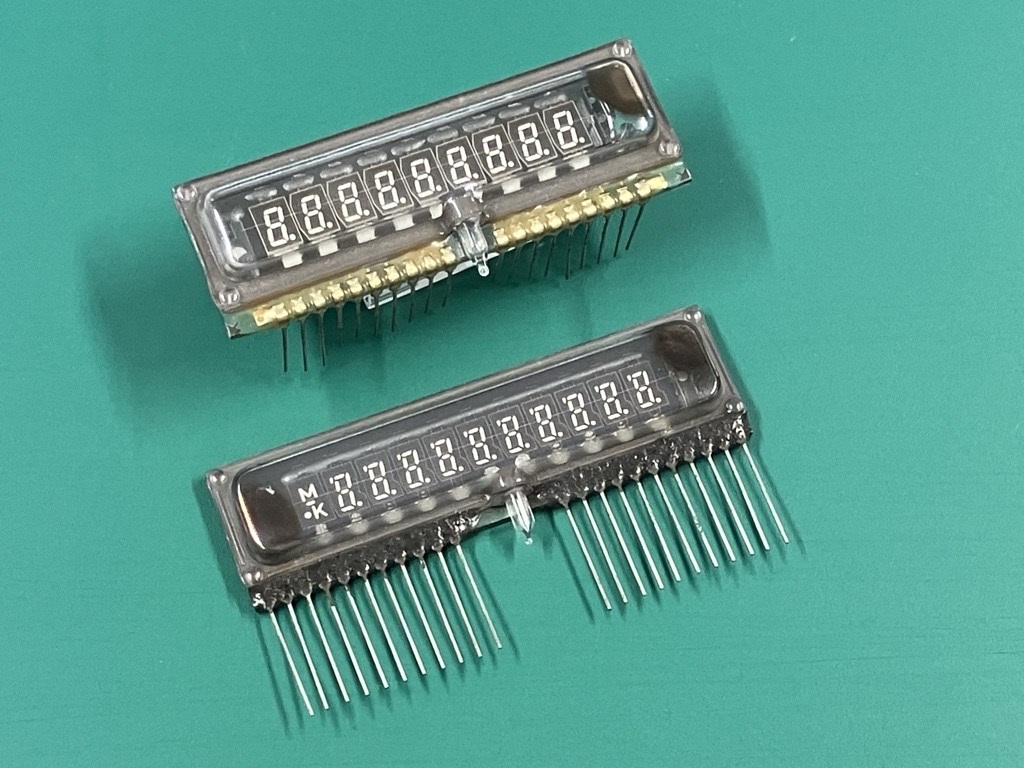 Figure 9 — Flat multi-digit tubes, with the digits printed on the glass base plate and the pins along one edge: the form of nearly every VFD calculator display after the mid-1970s.