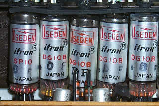 Figure 10 — Iseden Itron tubes in a Sharp QT-8D Micro Compet: DG10B digit tubes and an SP10 tube for the decimal point and minus sign, each labelled with the maker's name.