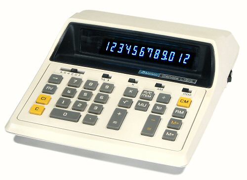 Figure 16 — The Canon L1214 of 1975, where Canon's desk line changed from neon gas-discharge panels to a twelve-digit blue fluorescent panel.