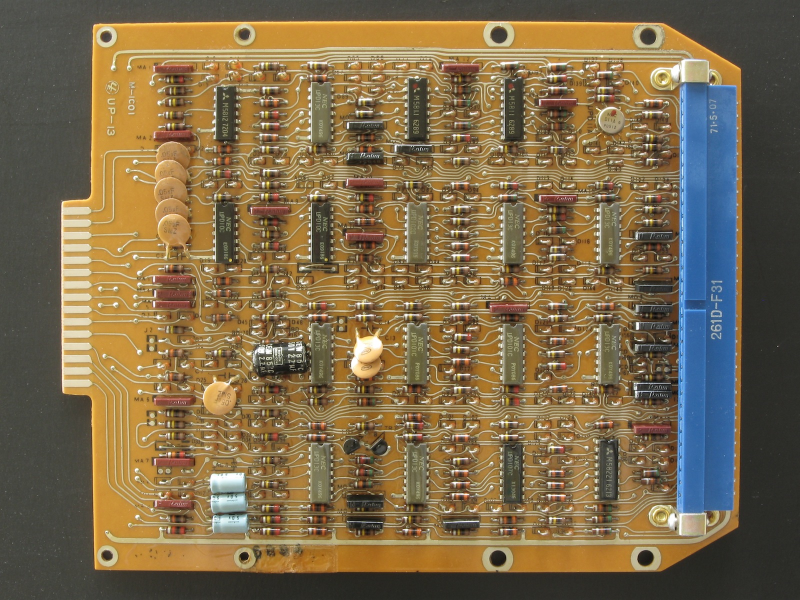 Figure 5 — One of the logic boards of a TEAL Royal Digital I of 1971: rows of small MOS chips, before the whole calculator went onto one.
